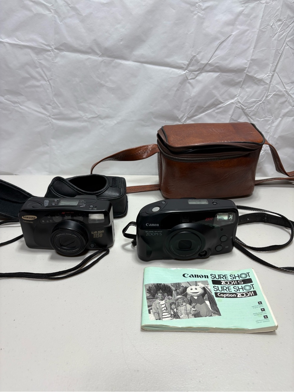 Canon Sure Shot Caption Zoom S & Samsung Panorama slim zoom 1150